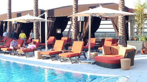 cabanas with umbrella and chaise lounge