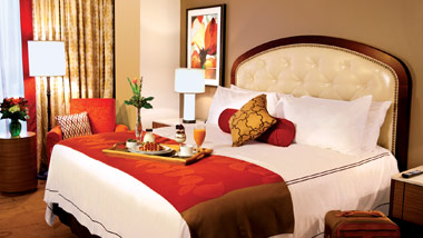 king room at L'Auberge Casino Hotel Baton Rouge with tray of food on it